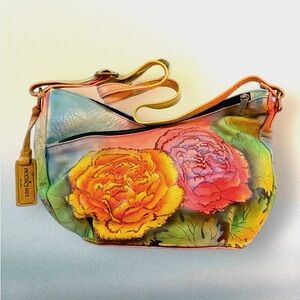 Anuschka leather Crossbody bag.